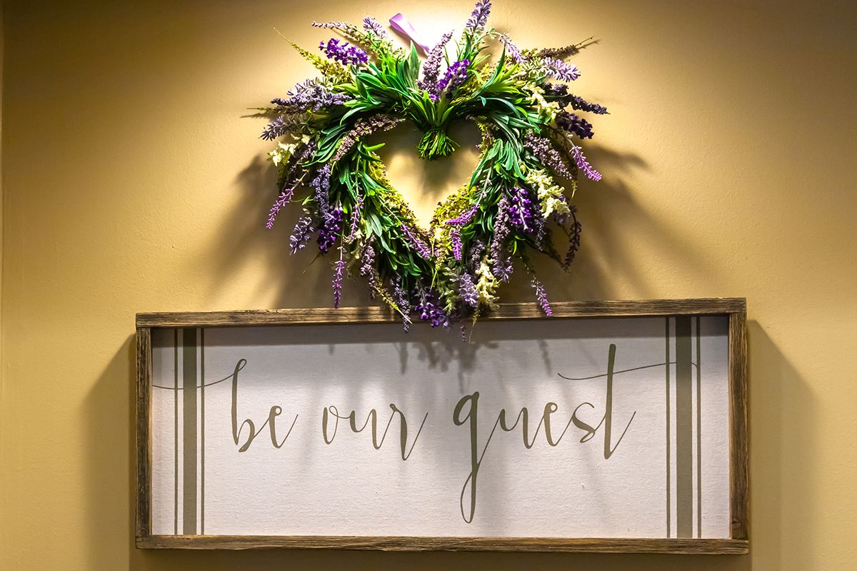 be out guest sign with heart shaped wreath